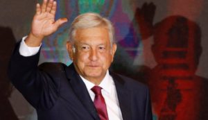 Presidential candidate Andres Manuel Lopez Obrador waves as he addresses supporters after polls closed in the presidential election, in Mexico City, Mexico July 1, 2018. REUTERS/Carlos Jasso TPX IMAGES OF THE DAY
